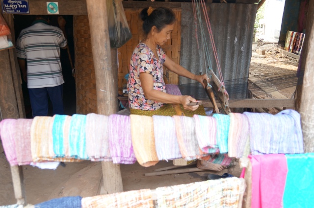 A local weaver selling her wares